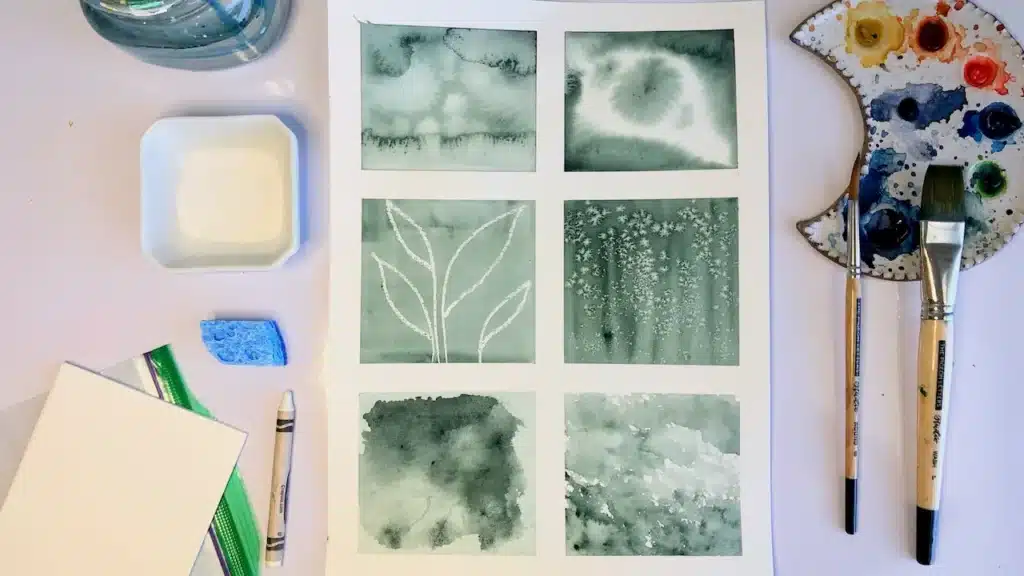 Watercolor techniques on paper with brushes and palette.