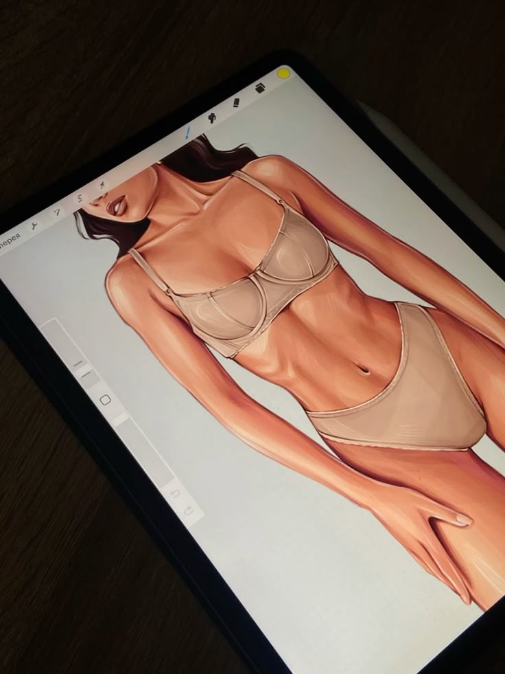 Digital illustration of a woman in beige lingerie on a tablet screen, showcasing art skills and design.