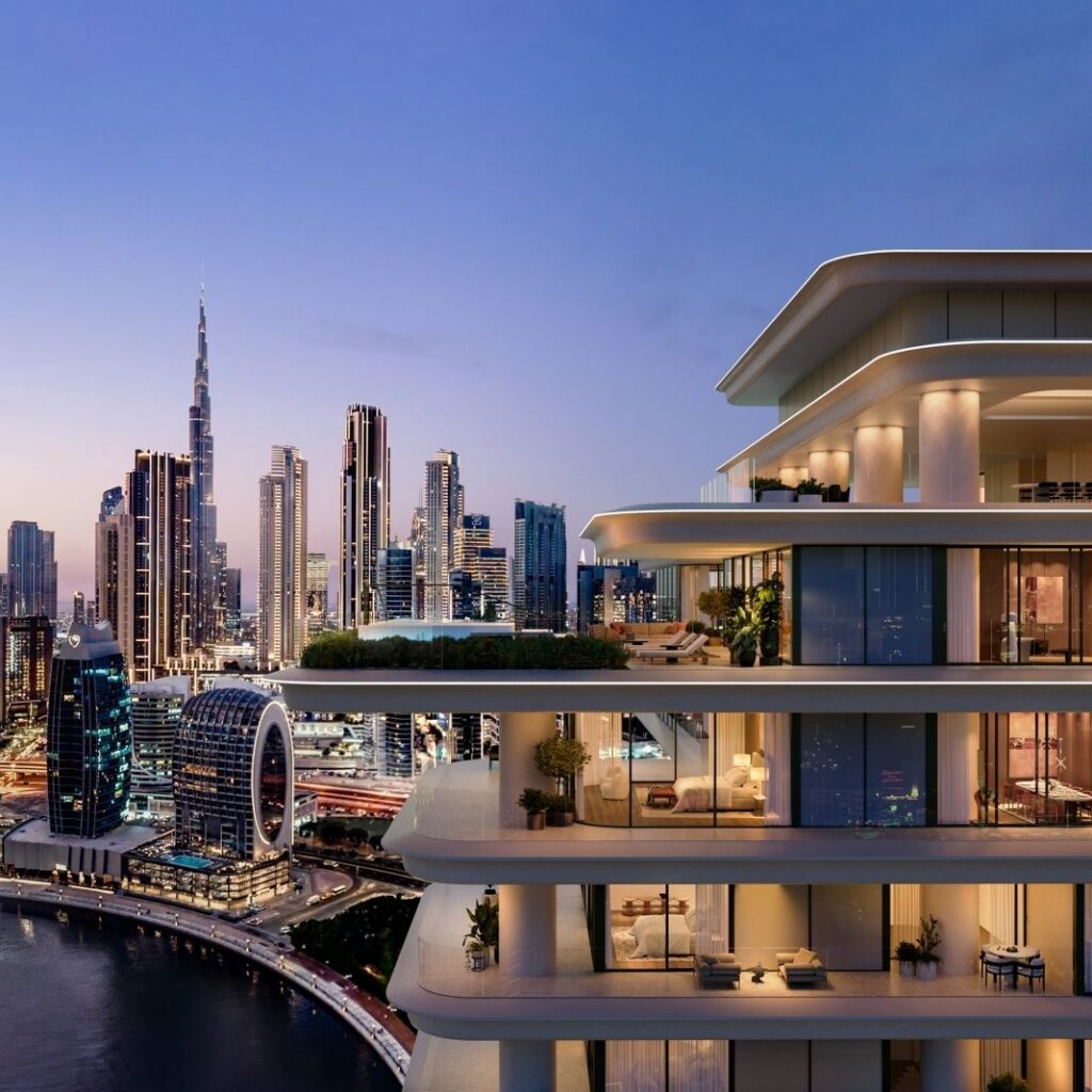Luxurious Dubai skyscraper with modern architecture and city skyline at dusk.