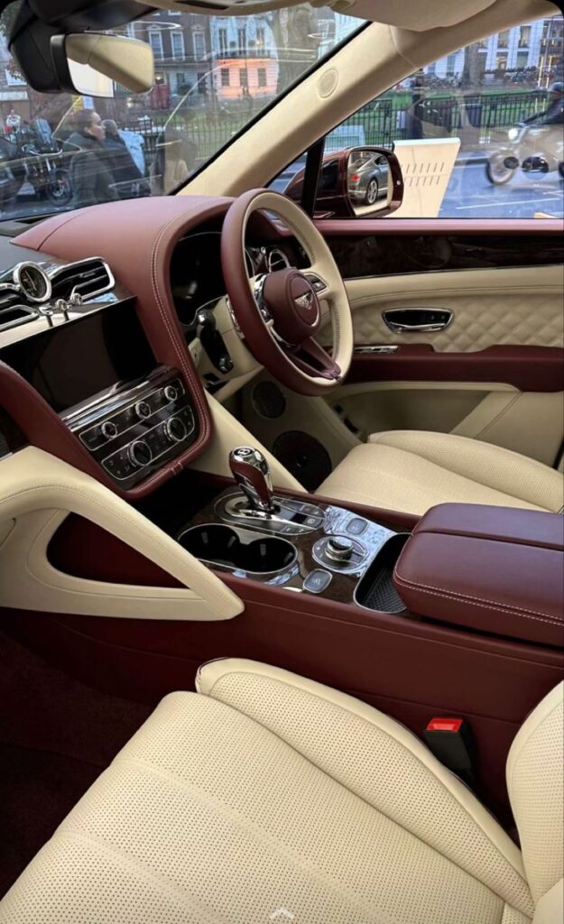 Luxurious car interior with leather seats, elegant dashboard, and advanced control panel in a premium vehicle.