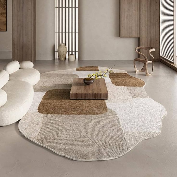 Modern living room with abstract rug, wooden coffee table, and curved sofa in neutral colors.