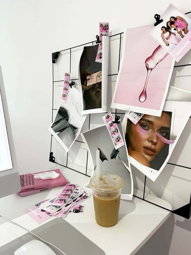 35d979df-77a9-4dd9-a361-3c849089e8f6 Creative workspace with photo collage, iced coffee, and pink aesthetic accents. | Sky Rye Design Creative workspace with photo collage, iced coffee, and pink aesthetic accents.