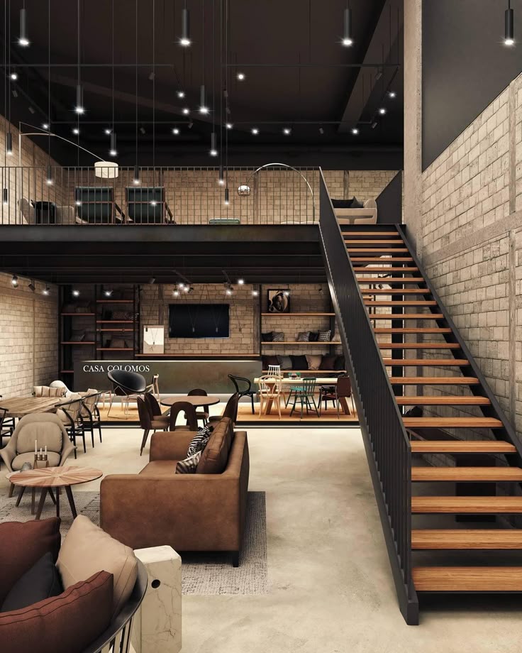 Modern industrial loft interior with stylish furniture, exposed brick walls, and mezzanine level staircase.