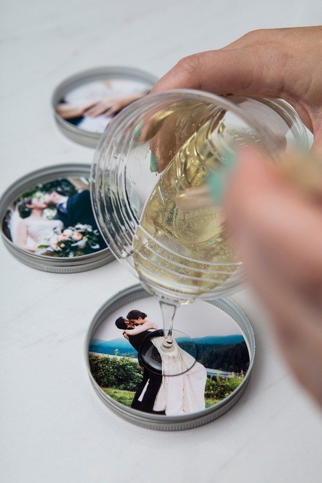 Pouring resin on coasters with wedding photos for a personalized DIY craft project.