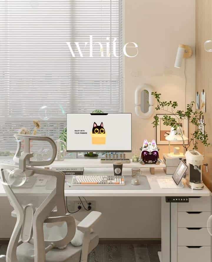 Minimalist workspace with ergonomic chair, computer, and decor, featuring plants and calming neutral tones.