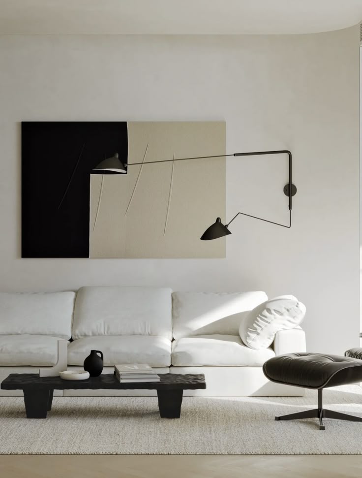 Modern living room with white sofa, abstract art, black coffee table, and sleek floor lamp. Minimalist interior design.