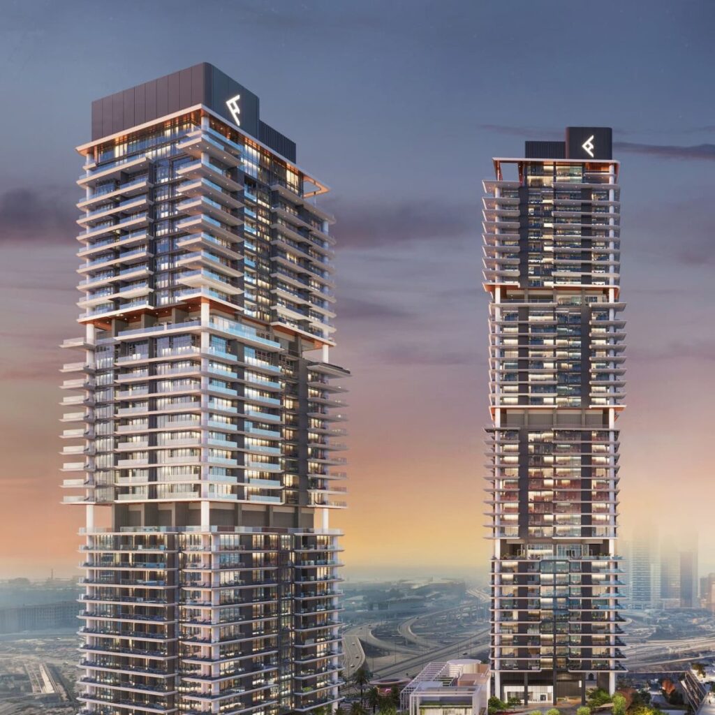 Two modern skyscrapers in urban setting during sunset, featuring sleek glass architecture and dynamic cityscape view.