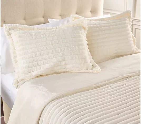 Berkshire Jacquard Fur Velvetsoft Coverlet Set - King - QVC_com Cream-colored bed with a textured duvet and matching pillows, set on a tufted headboard in a bright bedroom. | Sky Rye Design Cream-colored bed with a textured duvet and matching pillows, set on a tufted headboard in a bright bedroom.