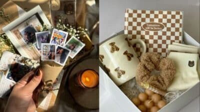 Hand holding photos next to a gift box with a mug, socks, notebook, and scrunchie, all in cozy, warm tones.
