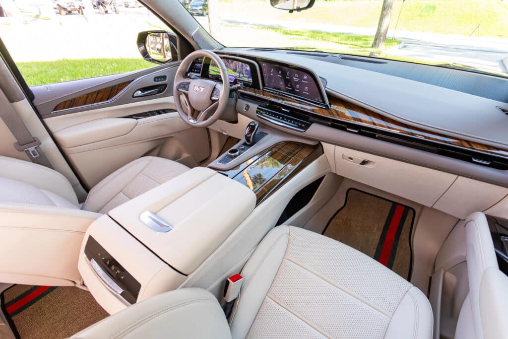 Luxurious SUV interior featuring sleek design, leather seats, and advanced dashboard technology.