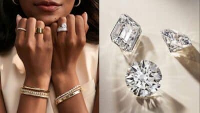 Woman showcasing diamond rings and bracelets; three loose diamonds on the right. Luxurious jewelry display.