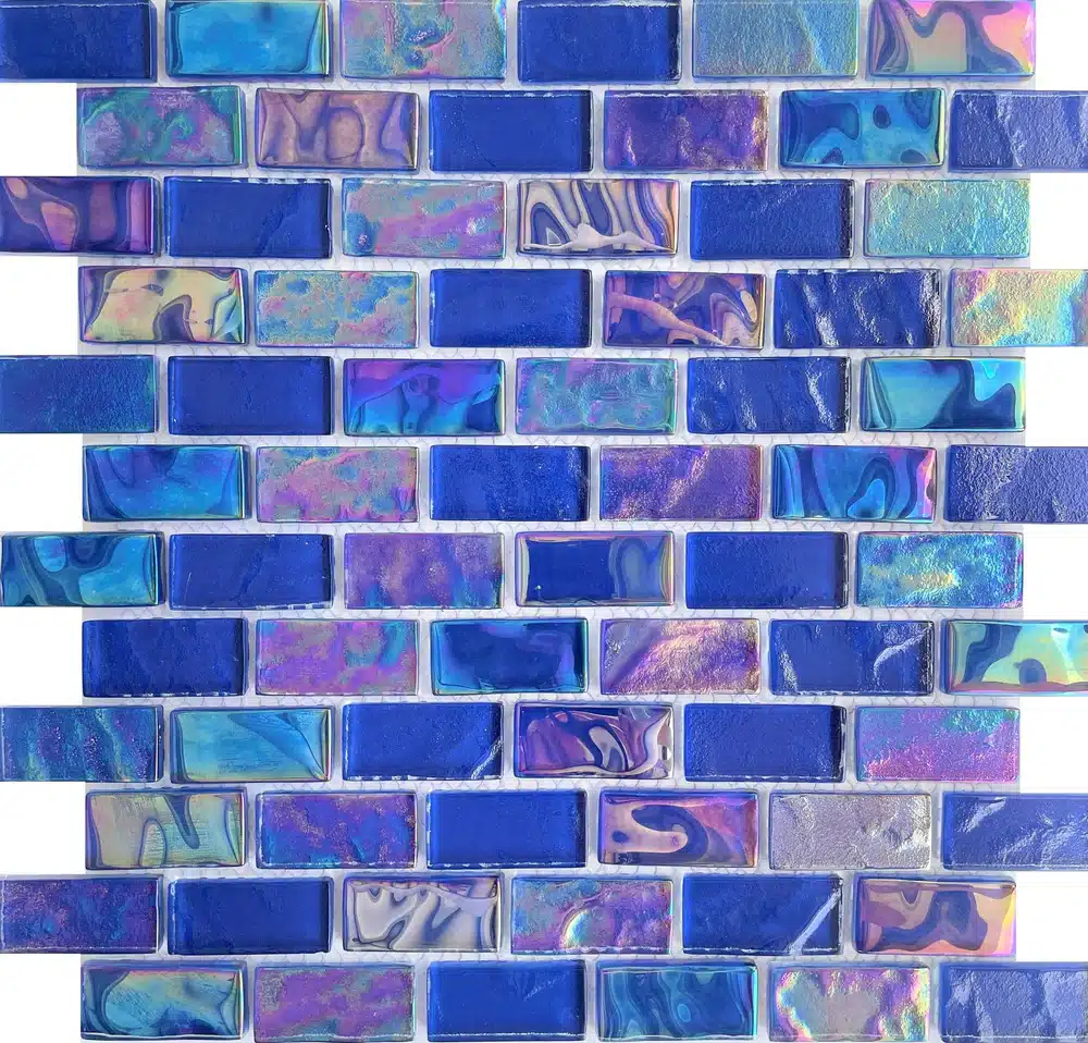 EquinoxCobalt1x2_1000x Iridescent blue and purple glass mosaic tiles in a brick pattern, ideal for kitchen or bathroom backsplashes. | Sky Rye Design Iridescent blue and purple glass mosaic tiles in a brick pattern, ideal for kitchen or bathroom backsplashes.