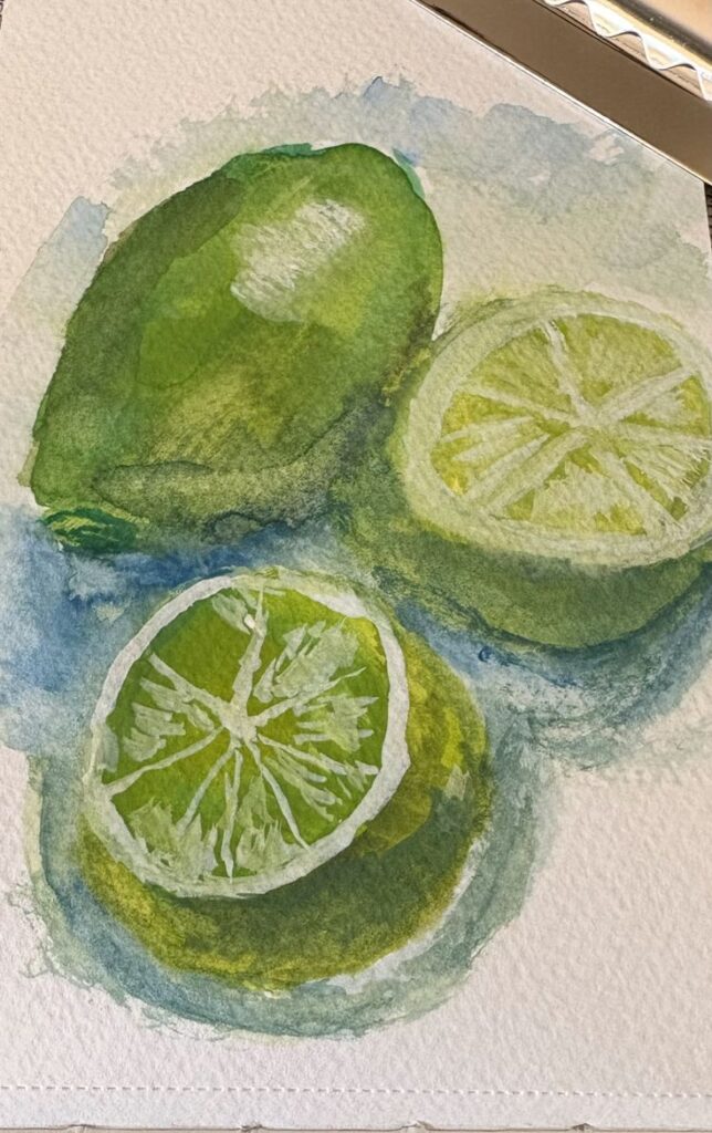 Watercolor painting of whole and sliced limes on textured paper with blue-green background.