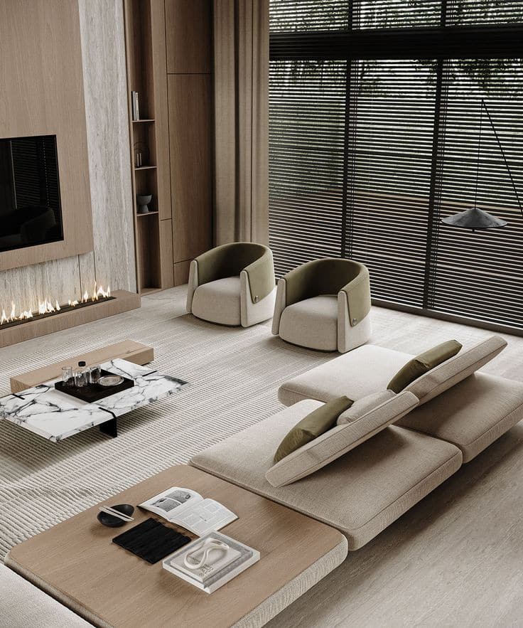 Modern living room with beige sofa, marble coffee table, and large windows with blinds, featuring stylish chairs.