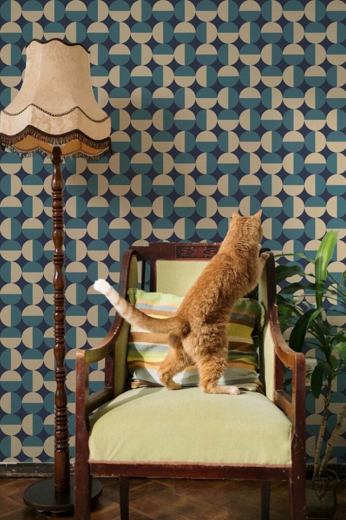 Retro Bold Circles Peel and Stick Wallpaper or Non-pasted Orange cat on vintage chair with retro lamp and geometric wallpaper. Mid-century decor with greenery. | Sky Rye Design Orange cat on vintage chair with retro lamp and geometric wallpaper. Mid-century decor with greenery.