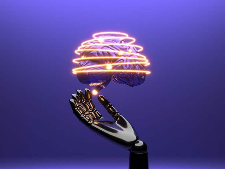 Robotic hand supporting a glowing digital brain, symbolizing AI and technology innovation against a purple background.