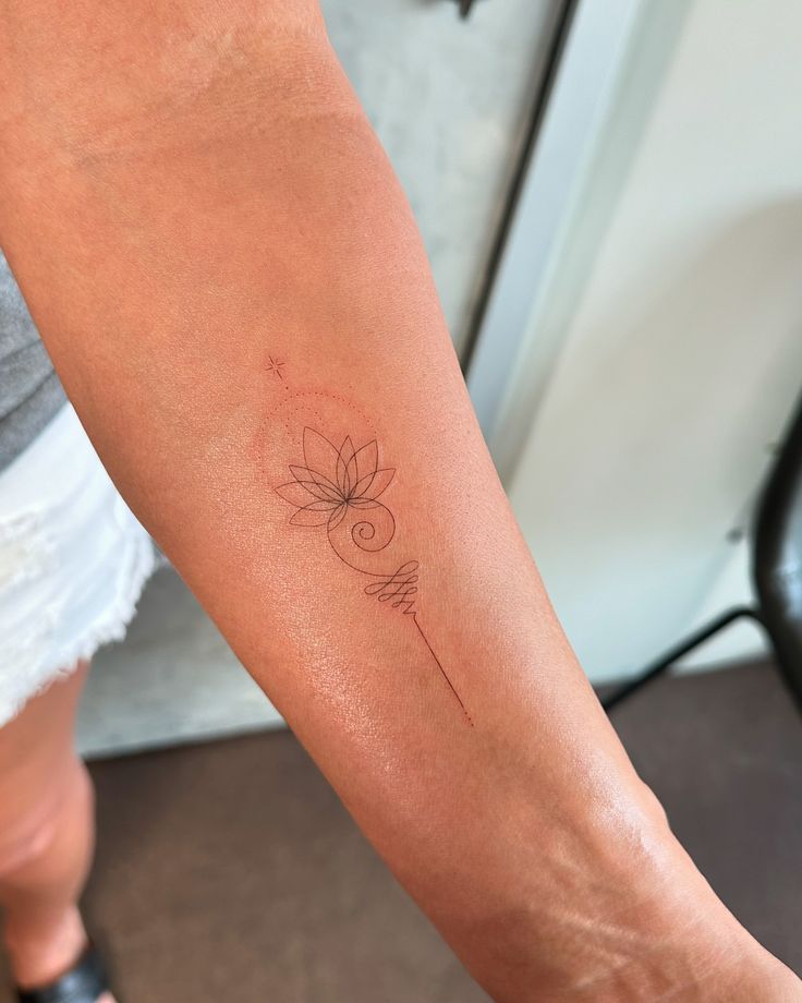 Unalome done with a single needle 🪡 tattoo tattooshop tattooart tattooideas tattooartist tattooist tattooing tattoostyle tattoodesigntattoos finelinetattoo finelinetattoos finelinetattooartist Minimalist floral tattoo on forearm with delicate linework and star detail. | Sky Rye Design Minimalist floral tattoo on forearm with delicate linework and star detail.