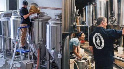 Brewers working with stainless steel brewing tanks in a brewery setting with equipment and ingredients.
