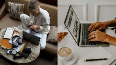 Woman working on laptop, smartphone by her side; coffee, croissant, and stationery nearby. Cozy remote work setup.