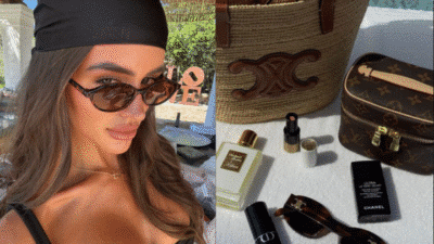 Fashionable woman in sunglasses and headscarf, with luxury accessories and makeup on a sunny day.