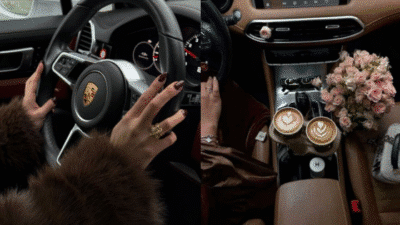 Luxurious car interior with coffee cups and flowers, showcasing stylish driving and elegance.