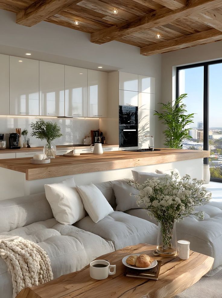 Modern open-concept living room and kitchen with cozy sofa, wooden accents, and large windows for natural light.