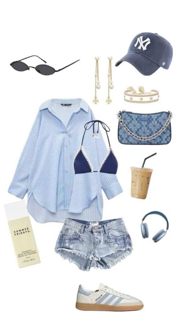Casual summer outfit with blue shirt, denim shorts, accessories, sunglasses, cap, headphones, and iced coffee.