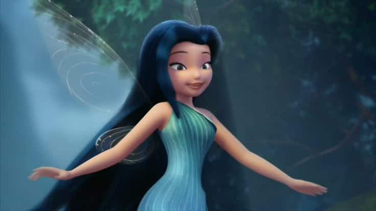 Animated fairy with long blue hair and wings, wearing a flowing teal dress in a lush forest setting.