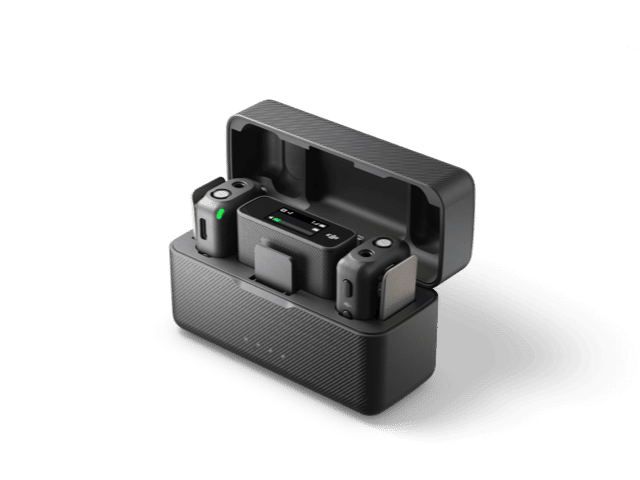 Compact wireless microphone system in a charging case, featuring dual mics and LED indicators.