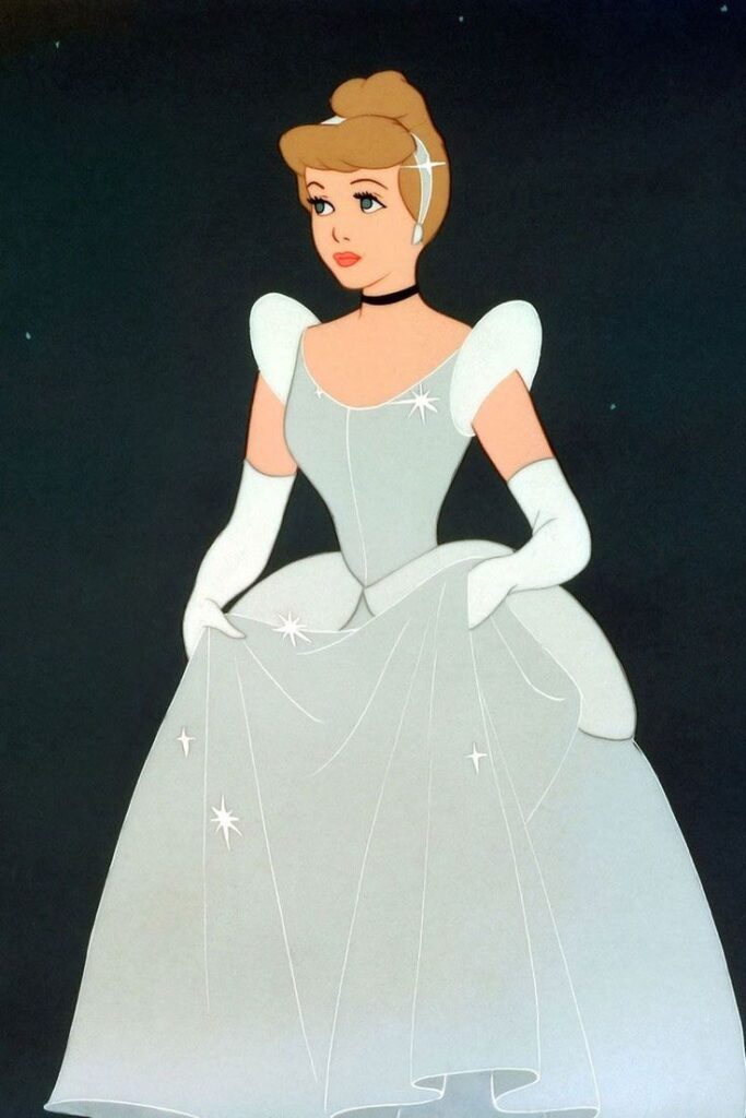 Elegant woman in a sparkling gown with gloves, set against a dark background, exuding timeless charm and grace.
