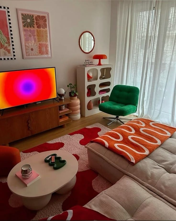 Colorful retro living room with vibrant decor, green chair, patterned rug, and modern art on the walls.
