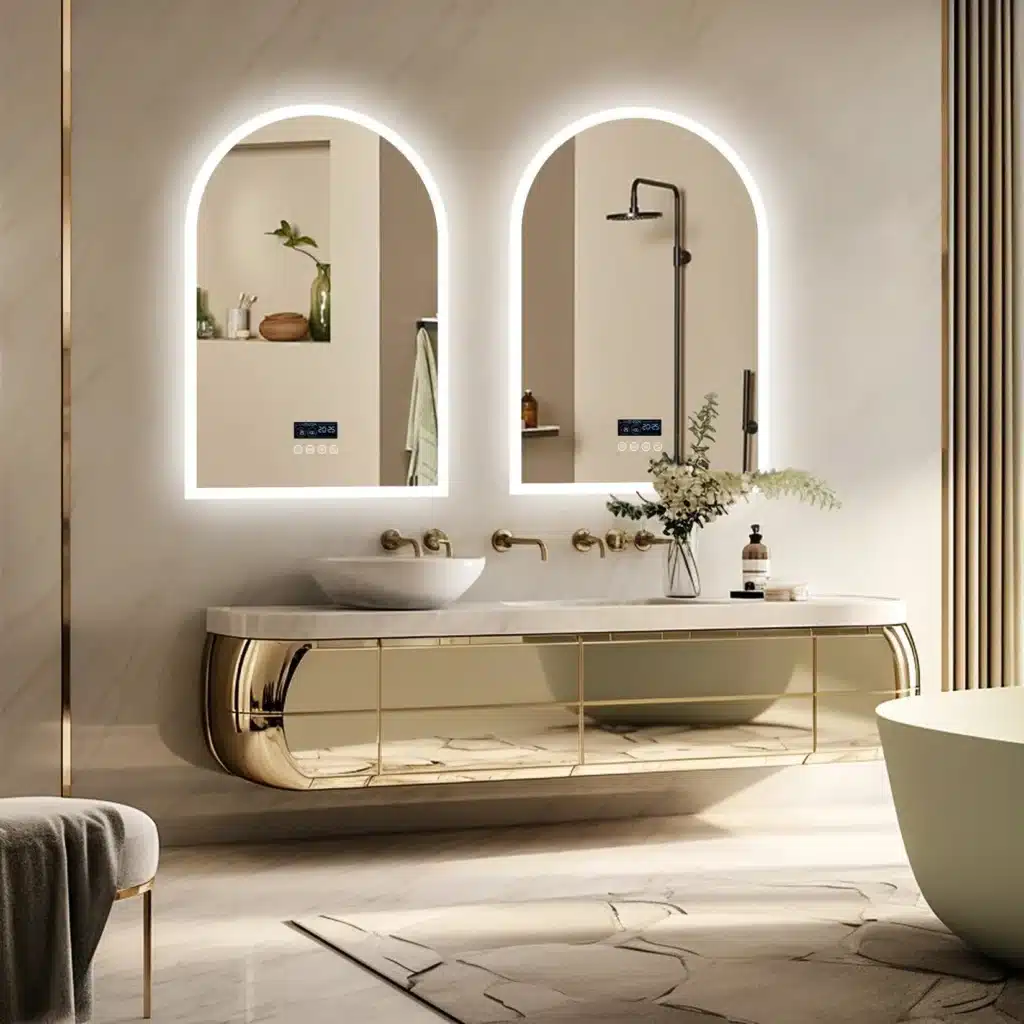 ec57c404-bdbd-4c9a-ab1d-335899a7e8cb_7a70a5d1-09ce-4447-bb74-a0fff808dfcf Modern luxury bathroom with LED mirrors, gold accents, and elegant decor. | Sky Rye Design Modern luxury bathroom with LED mirrors, gold accents, and elegant decor.