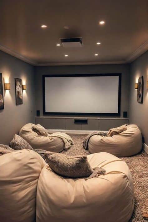 Cozy home theater with bean bags and large screen, soft lighting creating a relaxing ambiance.