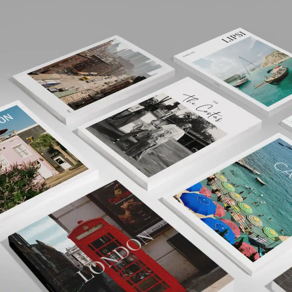 Assorted city-themed photo books laid out on a grey surface, featuring vibrant covers and global destinations.