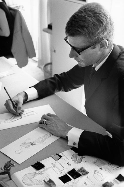 ♥Yves Saint Laurent Paris 1964 Marc Riboud Fashion designer sketching at a desk, creating fashion illustrations in a creative workspace. | Sky Rye Design Fashion designer sketching at a desk, creating fashion illustrations in a creative workspace.