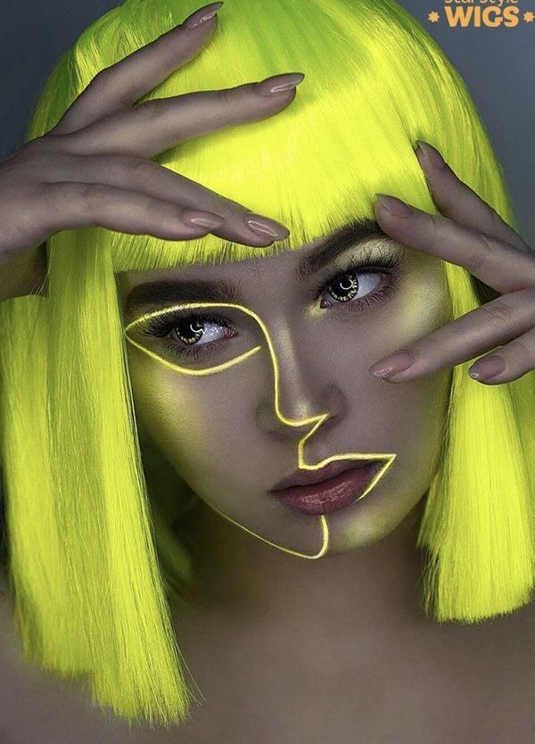 🖤VAMP🖤 Person with glowing neon face art and bright yellow wig, hands framing face. Edgy and vibrant look for fashion statement. | Sky Rye Design Person with glowing neon face art and bright yellow wig, hands framing face. Edgy and vibrant look for fashion statement.