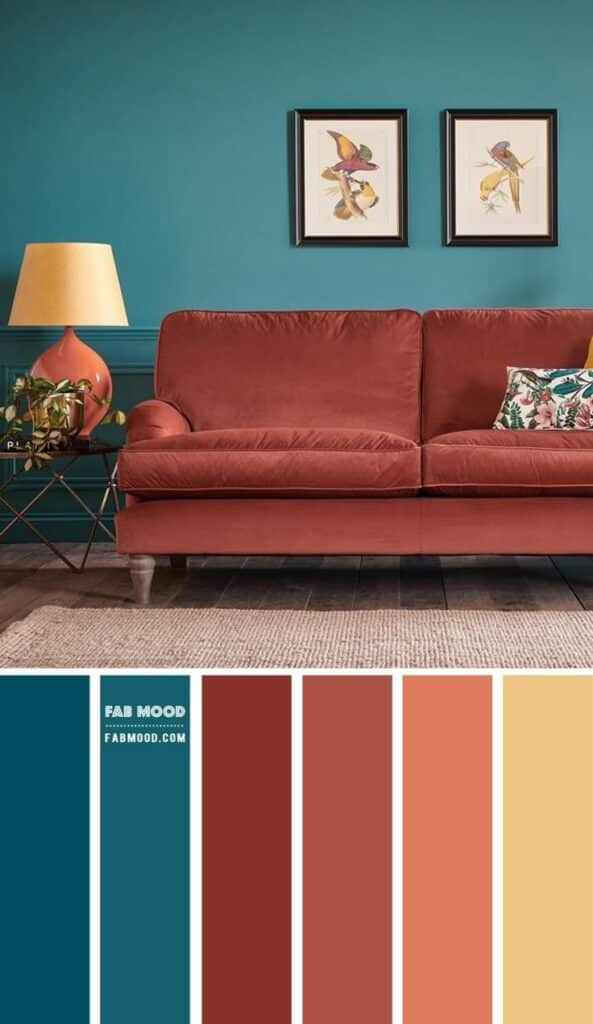 Cozy living room with terracotta sofa, teal wall, bird art, and color palette. Elegant modern home decor inspiration.