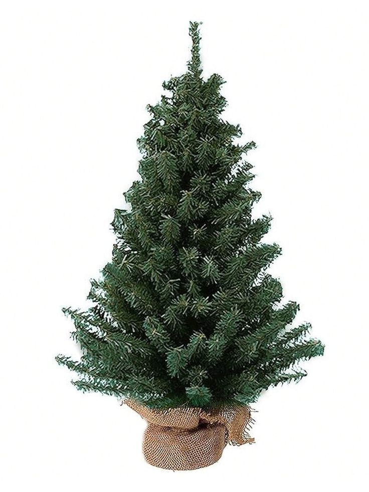 Artificial Christmas tree with burlap base, perfect for holiday decoration.