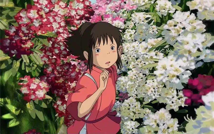 Animated girl in pink kimono among vibrant flowers, expressing surprise.