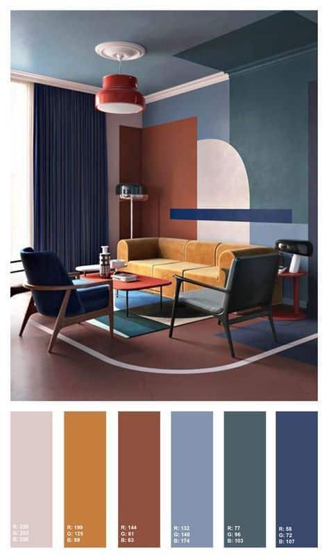 Modern living room with colorful geometric decor, featuring a mustard sofa, blue chairs, and artistic wall design.