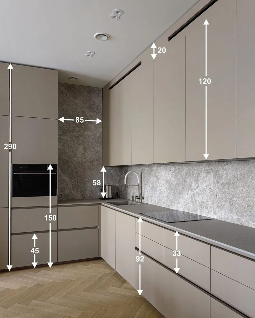 Modern kitchen design with minimalist cabinets, marble backsplash, and precise measurements in a neutral color palette.