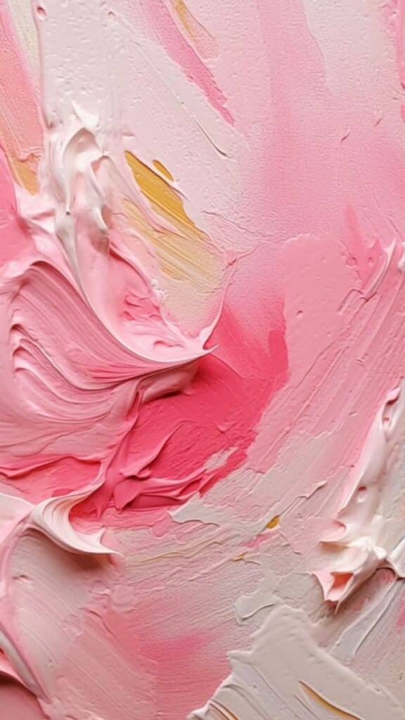 Pink and white abstract oil paint texture with yellow accents on canvas.