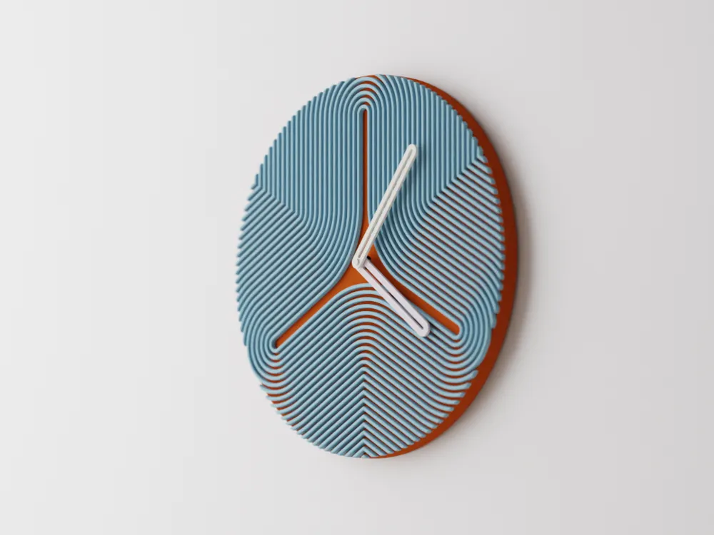 Stylish blue and orange abstract wall clock with unique, modern geometric design on white background.