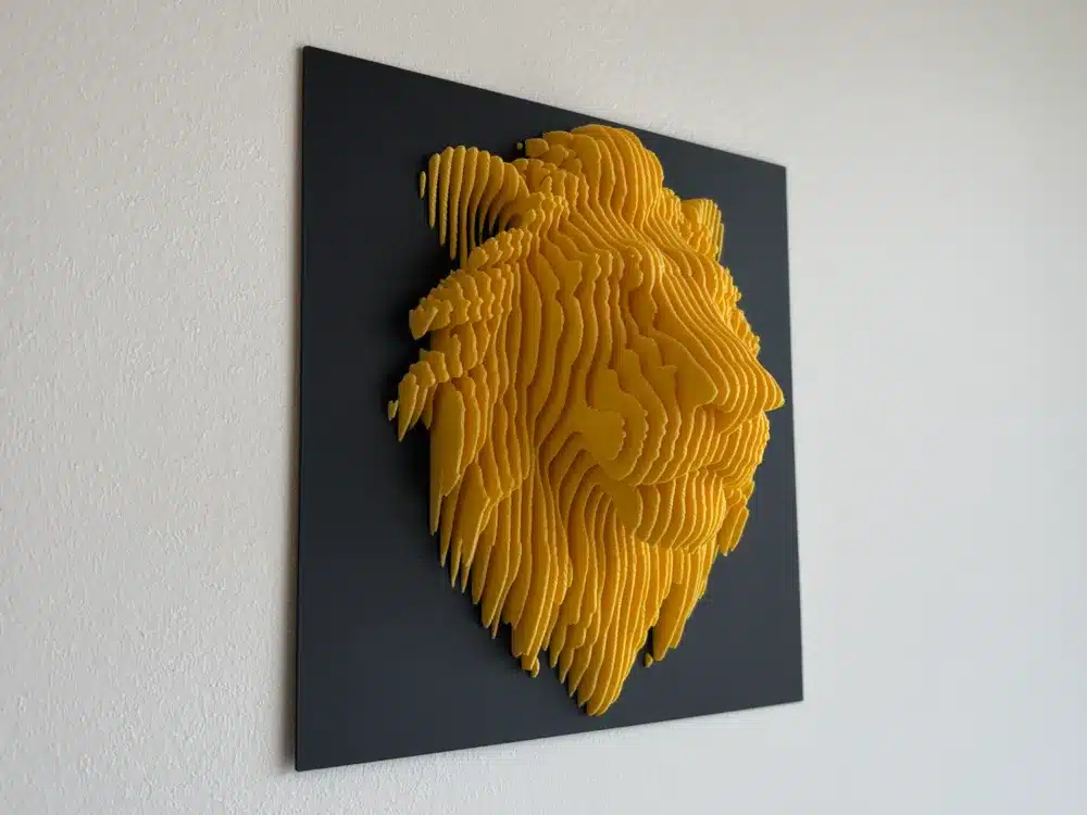 3D yellow lion head wall art on dark background, showcasing intricate layered design and modern decor style.