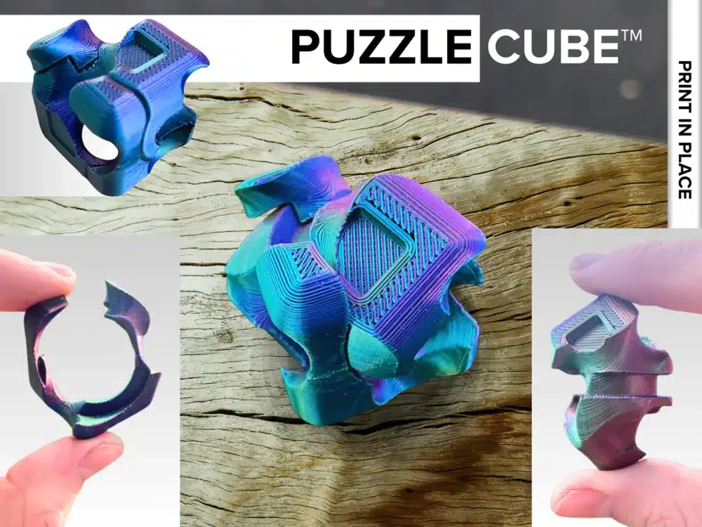 Colorful 3D-printed puzzle cube with interlocking pieces, showcasing its intricate design and print-in-place feature.