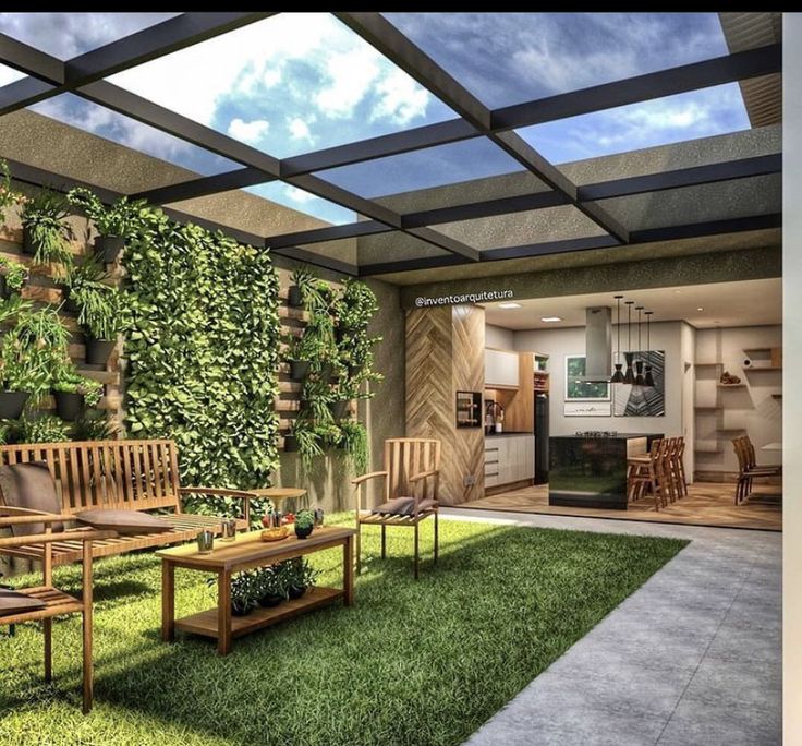 _ 21 Modern patio with vertical garden, wooden furniture, and open kitchen in a spacious outdoor-indoor design. | Sky Rye Design Modern patio with vertical garden, wooden furniture, and open kitchen in a spacious outdoor-indoor design.