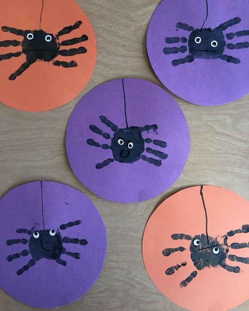 261223e9071e579c91280a00c2b5689b Halloween spider crafts made with handprints on colorful paper circles: a fun and creative kids' activity. | Sky Rye Design Halloween spider crafts made with handprints on colorful paper circles: a fun and creative kids' activity.