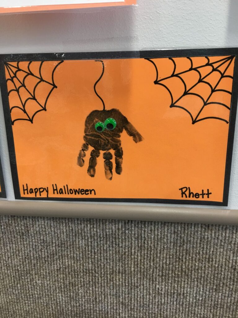 2a7b15873cda95f4eac400ada49cbcc5 Child's Halloween art with a spider handprint, cobwebs, Happy Halloween text on orange background. | Sky Rye Design Child's Halloween art with a spider handprint, cobwebs, Happy Halloween text on orange background.