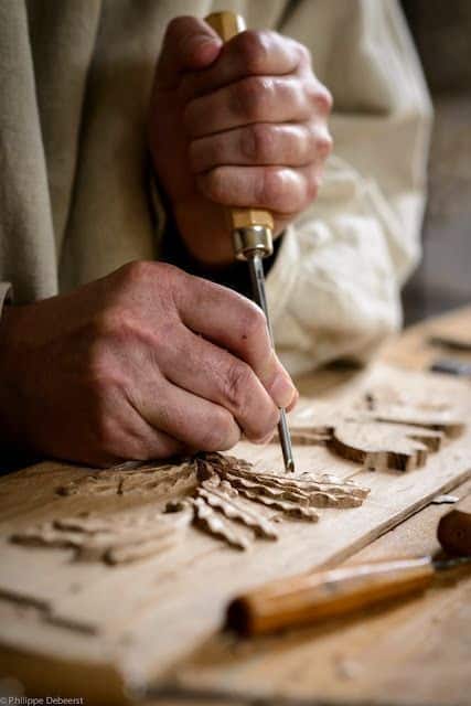 _ 3 Close-up of hands carving intricate woodwork with a chisel, showcasing craftsmanship and detailed woodworking. | Sky Rye Design Close-up of hands carving intricate woodwork with a chisel, showcasing craftsmanship and detailed woodworking.