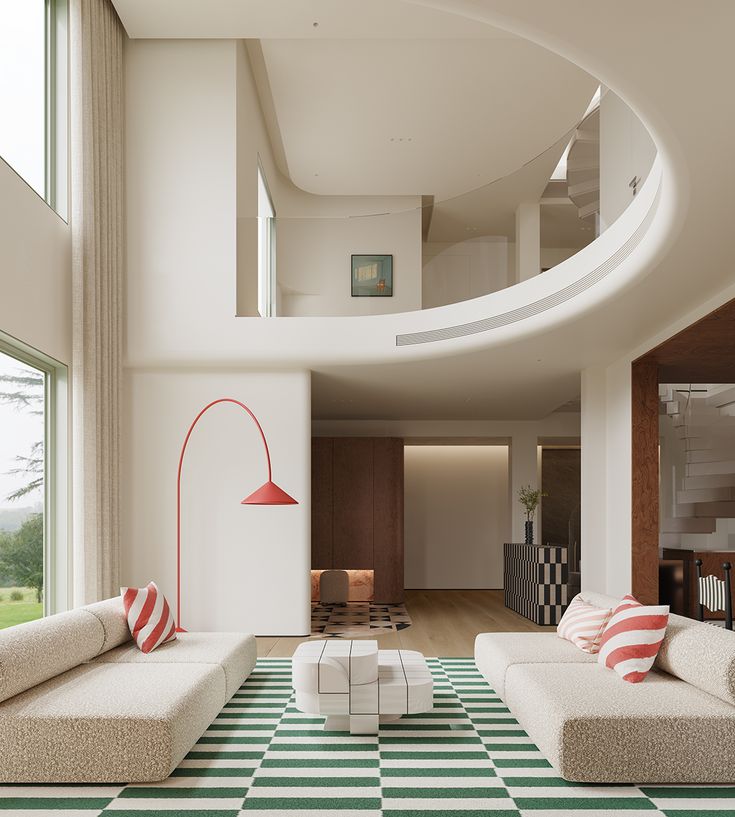 Modern living room with stylish white sofas, red lamp, and green-striped carpet in open, airy space.